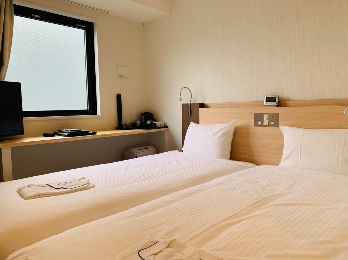 Toyotomi Inn 難波高津 أوساكا المظهر الخارجي الصورة